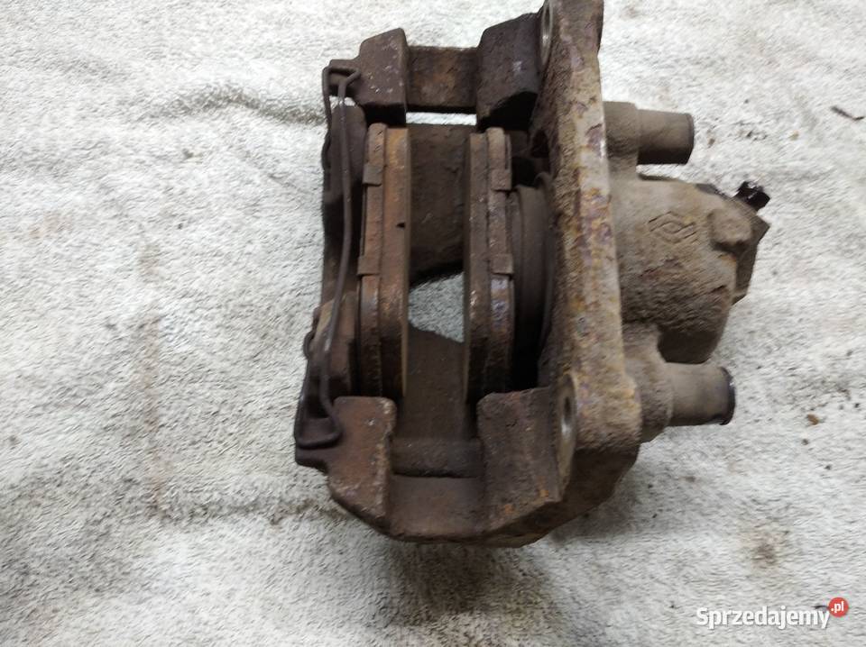 Laguna III zacisk hamulca prawy przód wielkopolskie Swarzędz