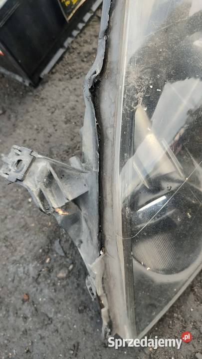 Reflektor lampa lewa prawa przód przednia Opel wielkopolskie Książ Wielkopolski