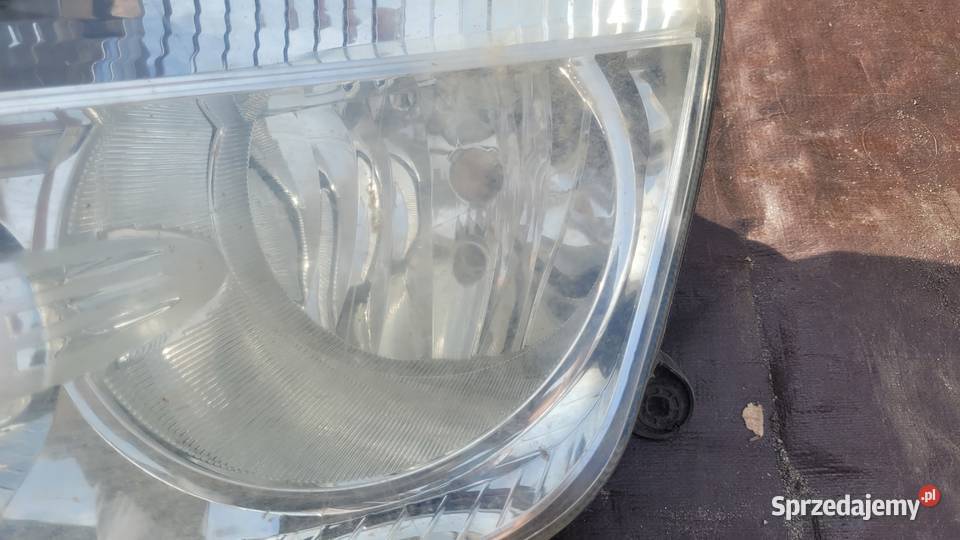 Dacia Duster I LAMPA LEWA PRZÓD REFLEKTOR LEWY osobowe Lampy przednie Ruda Śląska