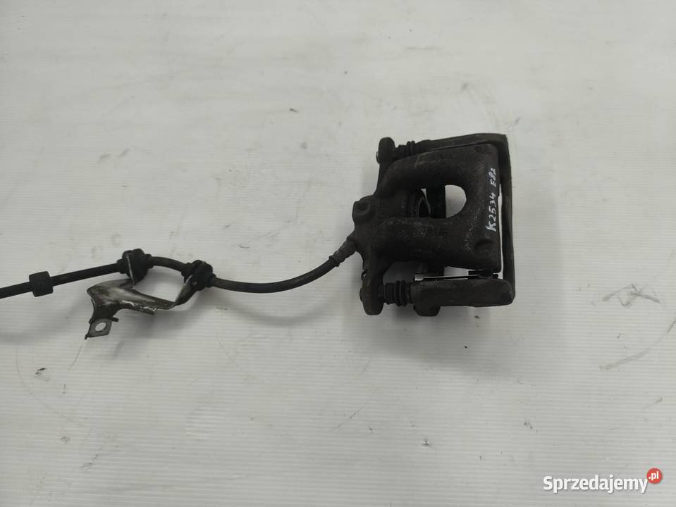 ZACISK PRAWY TYŁ BMW 1 E87 E81 LIFT 16