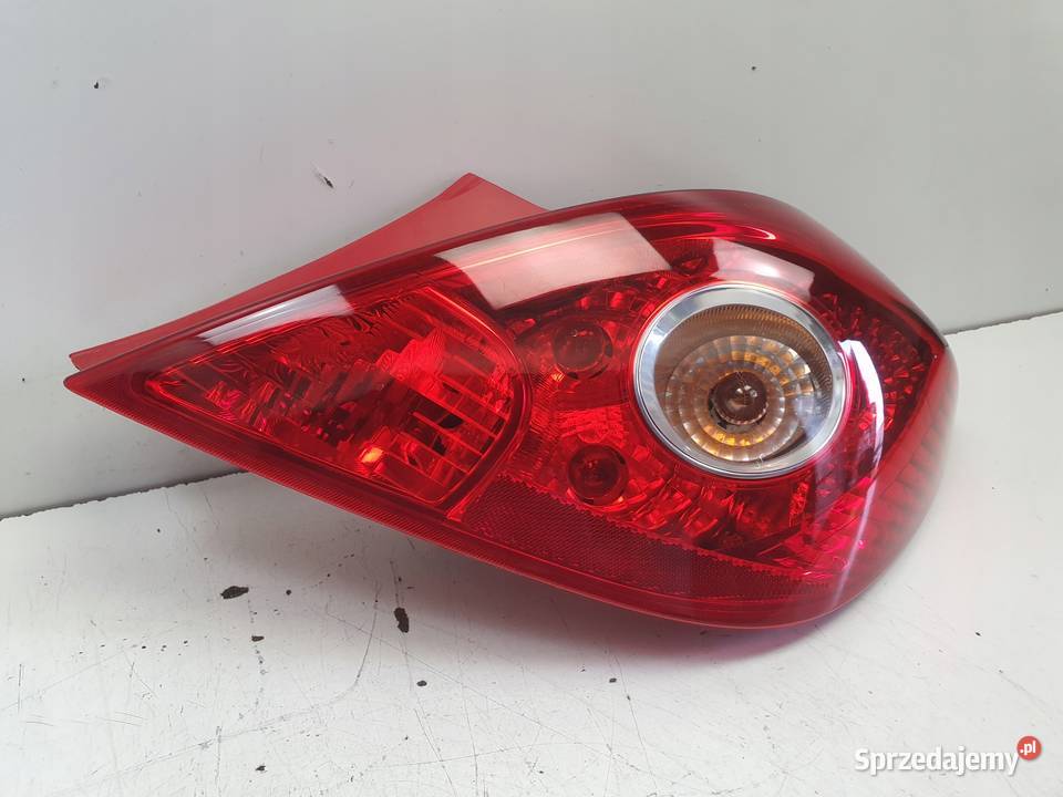 Opel Corsa D 3D 0614r TYLNA TYLNIA LAMPA PRAWA Rudka