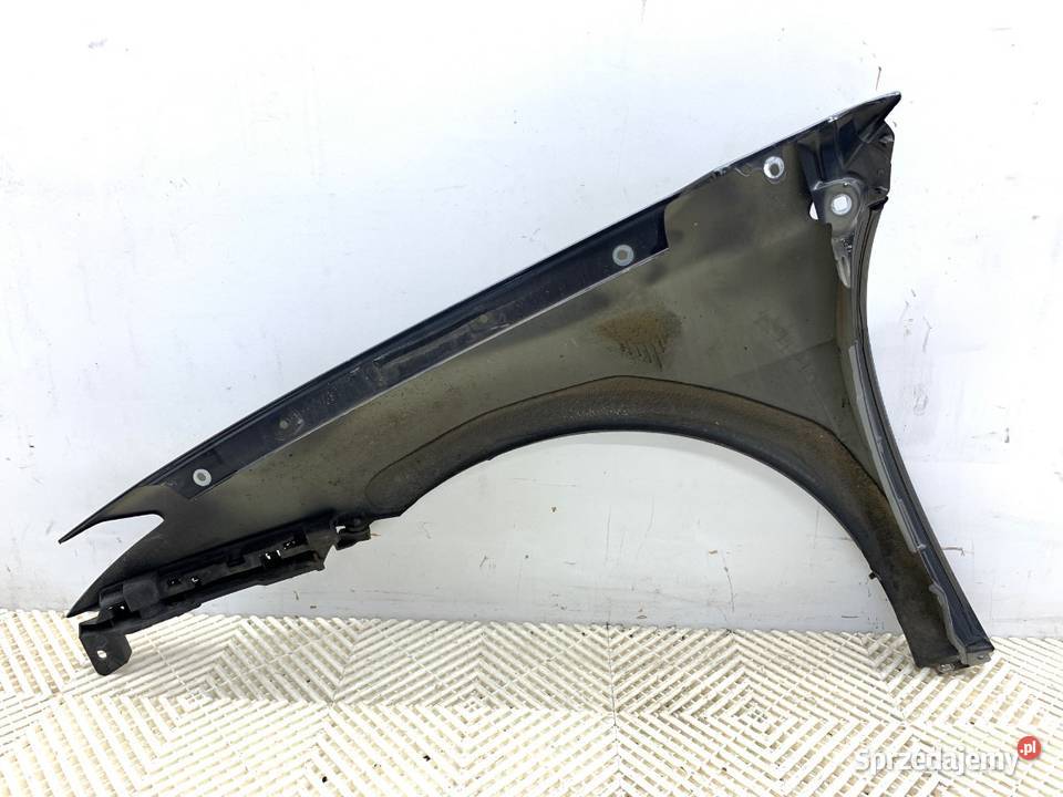 BŁOTNIK PRAWY PRZÓD RENAULT LAGUNA III Hatchback