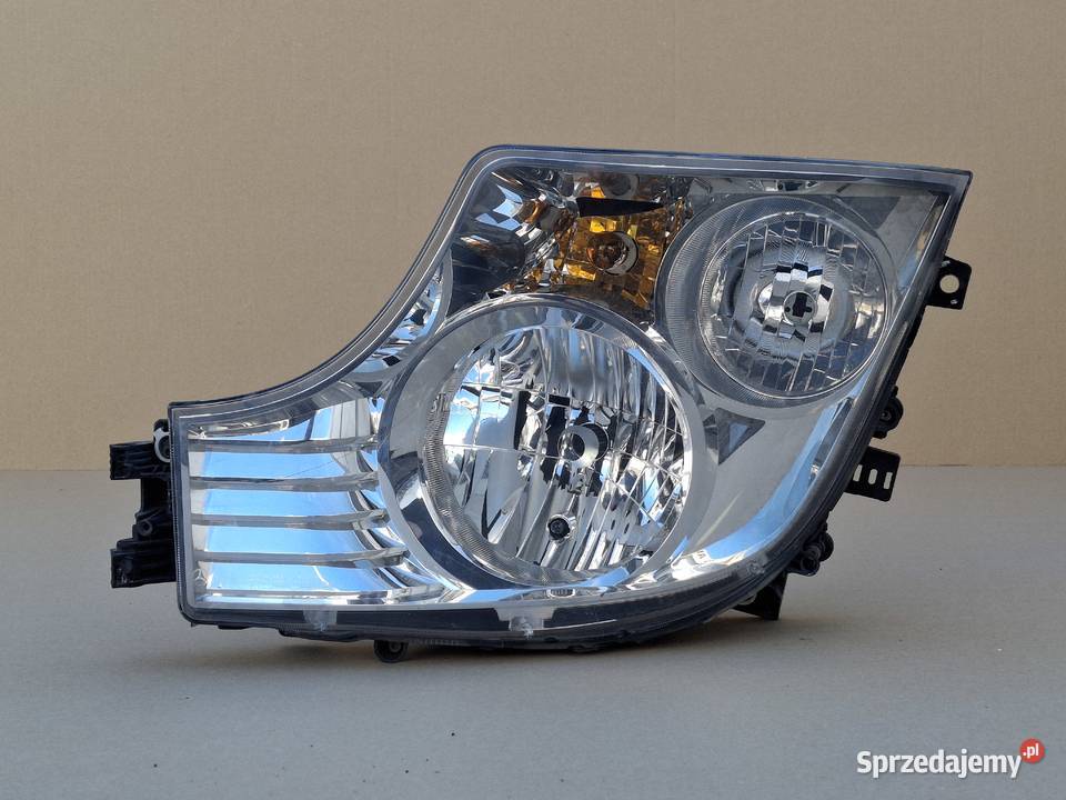 MECEDES ACTROS MP4 REFLEKTOR PRAWY ORYGINALNY Bieleń