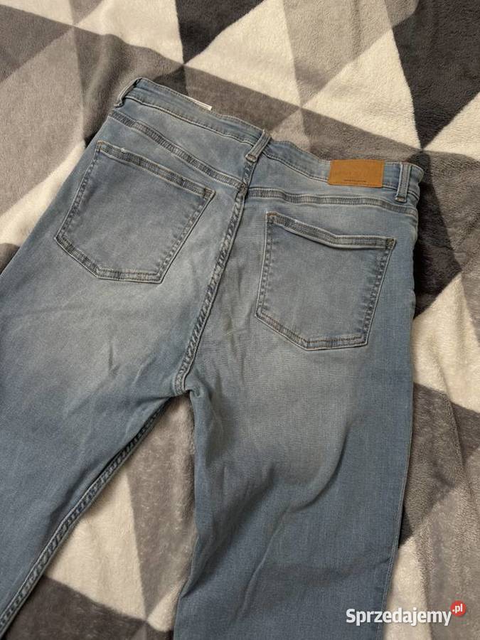 Jeansy dzwony flare denim wysoki stan Bez wzoru Rumia