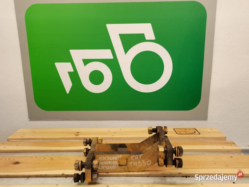 Mocowanie siłownika wysuwu CAT TH 330