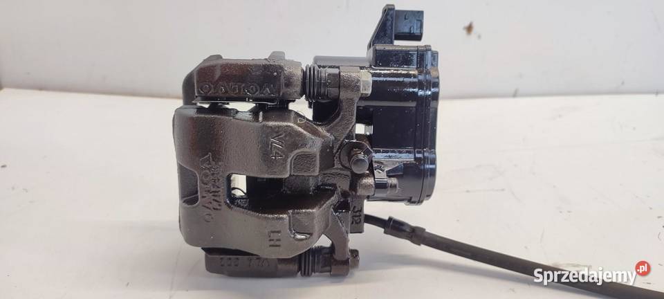 VOLVO XC40 ZACISK HAMULCOWY LEWY TYŁ 32276921