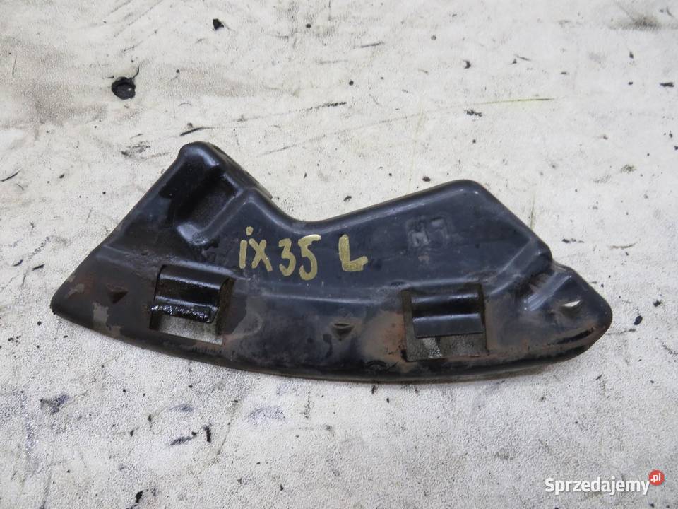 ŚLIZG POD LAMPĘ LEWY PRZÓD HYUNDAI IX35 Części montażowe Karoseria