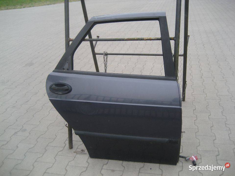 saab 900 9396r drzwi tył lewe prawe Rakoniewice sprzedam