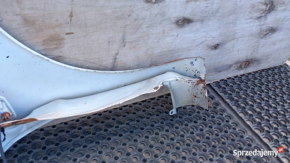 FIAT GRANDE PUNTO BŁOTNIK PRZÓD LEWY 296 Zbierkowo