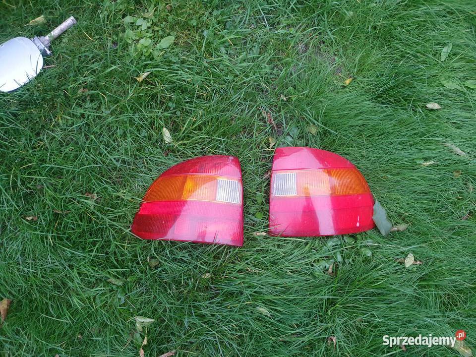 Lampa tylna prawa lewa Opel Astra f I sedan 9195 Uniwersalne Oświetlenie