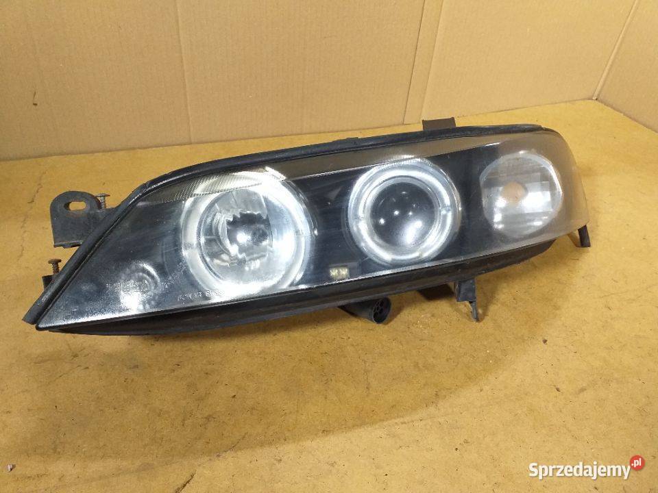 135G OPEL VECTRA B LIFT Xenon Reflektor Lampa Włoszczowa