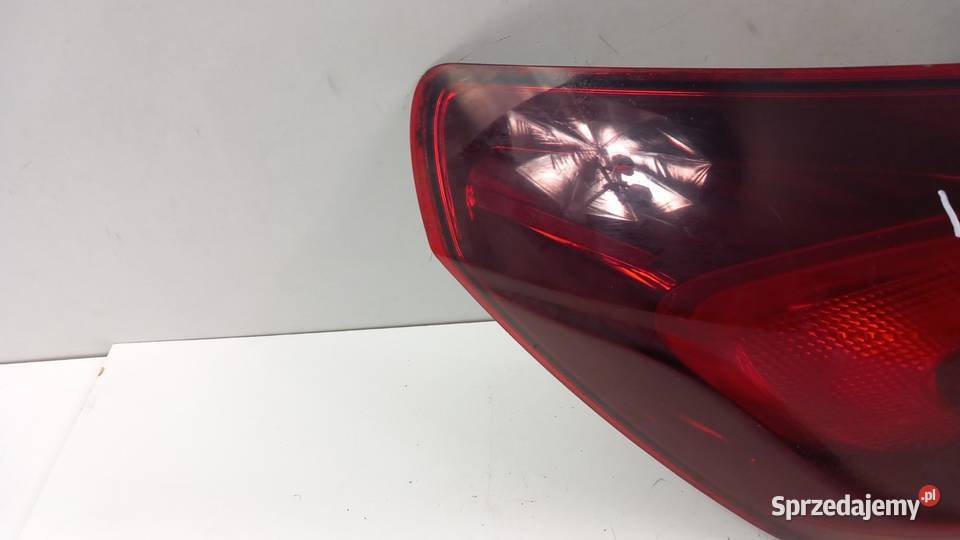 OPEL ASTRA J HB LAMPA TYŁ LEWY DYMIONA osobowe Światła stop Zbierkowo