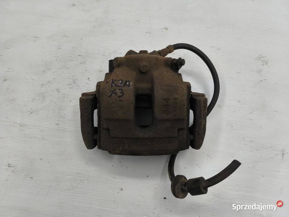 ZACISK PRAWY PRZÓD BMW X3 E83