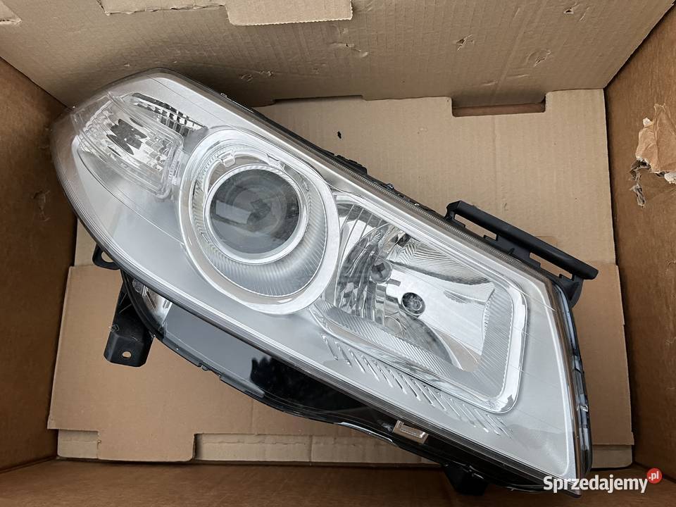 Reflektor RENAULT 7701063220 260103726R mazowieckie