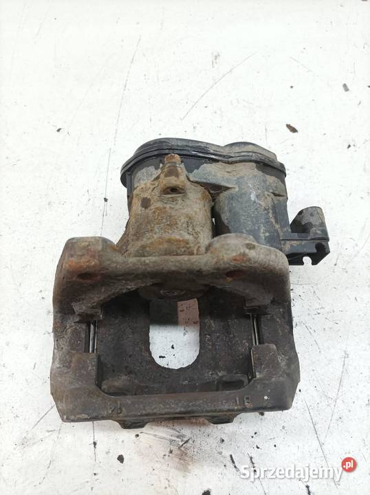 ZACISK HAMULCOWY LEWY TYŁ 20 D ELEKTRYCZNY Bmw