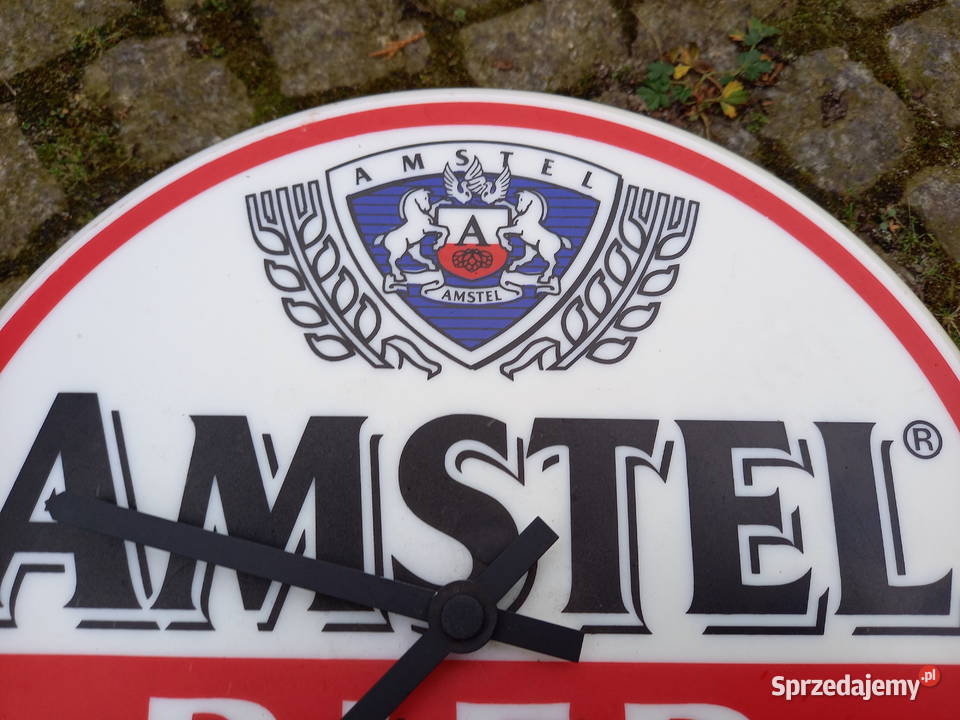 Zegar kapsel reklama piwa AMSTEL