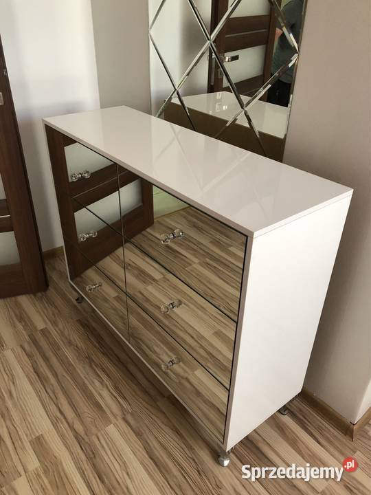 Komoda polyskowa biała z lustra lustrzana noga Kępno