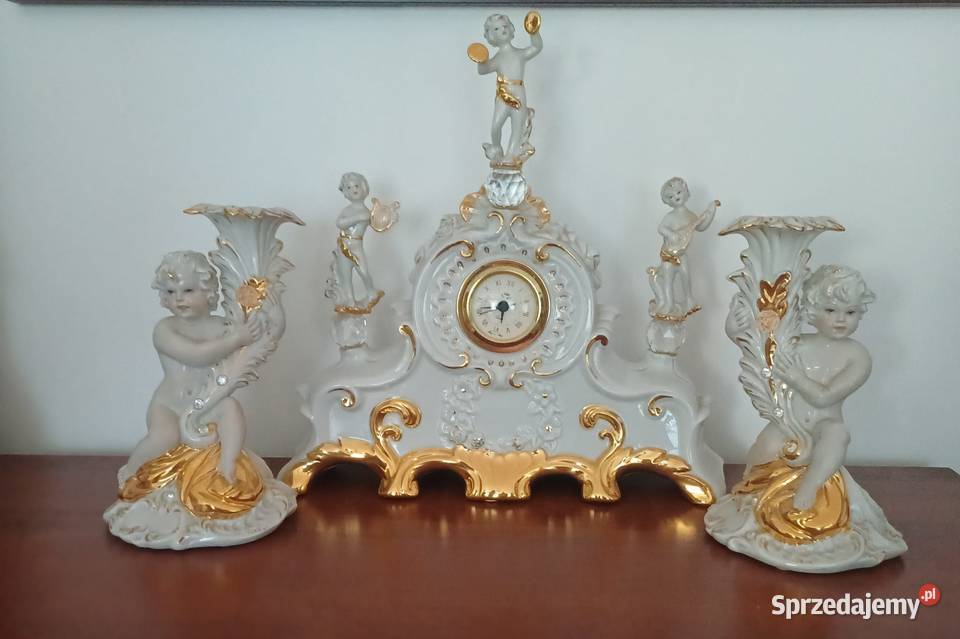 Porcelanowy zegar kominkowy z dwoma cherubinami Porcelana i szkło