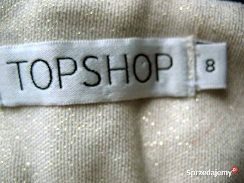 Spodnie złote rurki 36 S biodra 74 sprzedam