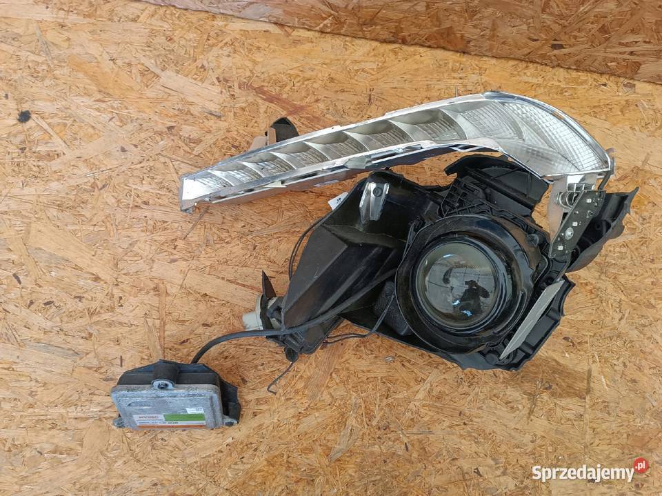 SOCZEWKA LAMPY PRAWY PRZÓD 28323AB 68280815AA Nowy Tomyśl