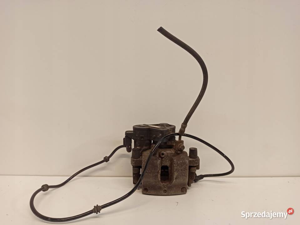 MERCEDES W205 ZACISK LEWY TYŁ A2054231998 osobowe