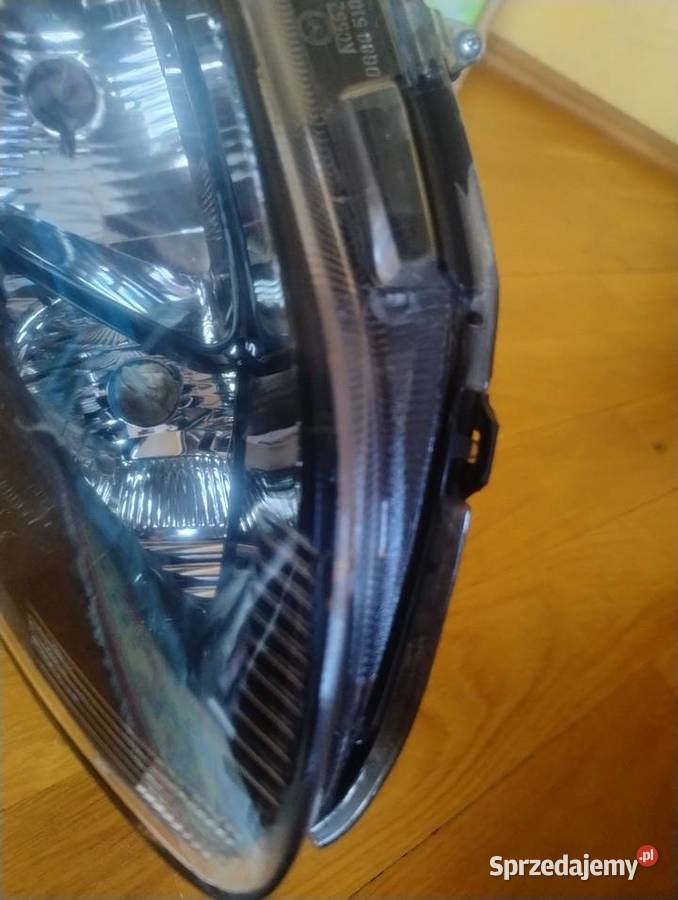 Mazda 2 0714 lampa reflektor lewa przednia przód