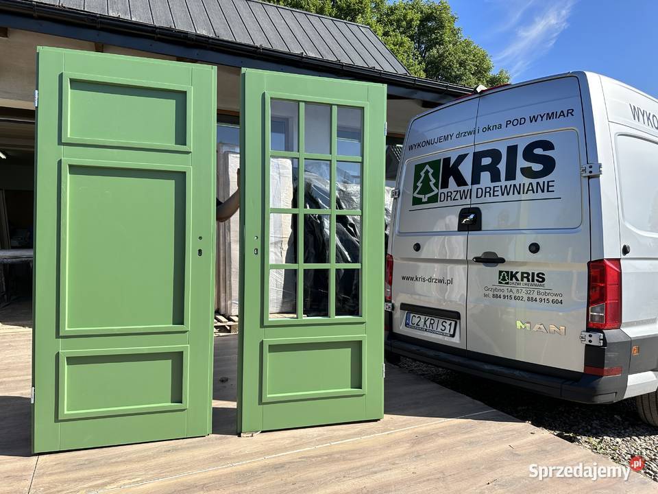 Drzwi zewnętrzne drewniane z klamką schlage NA