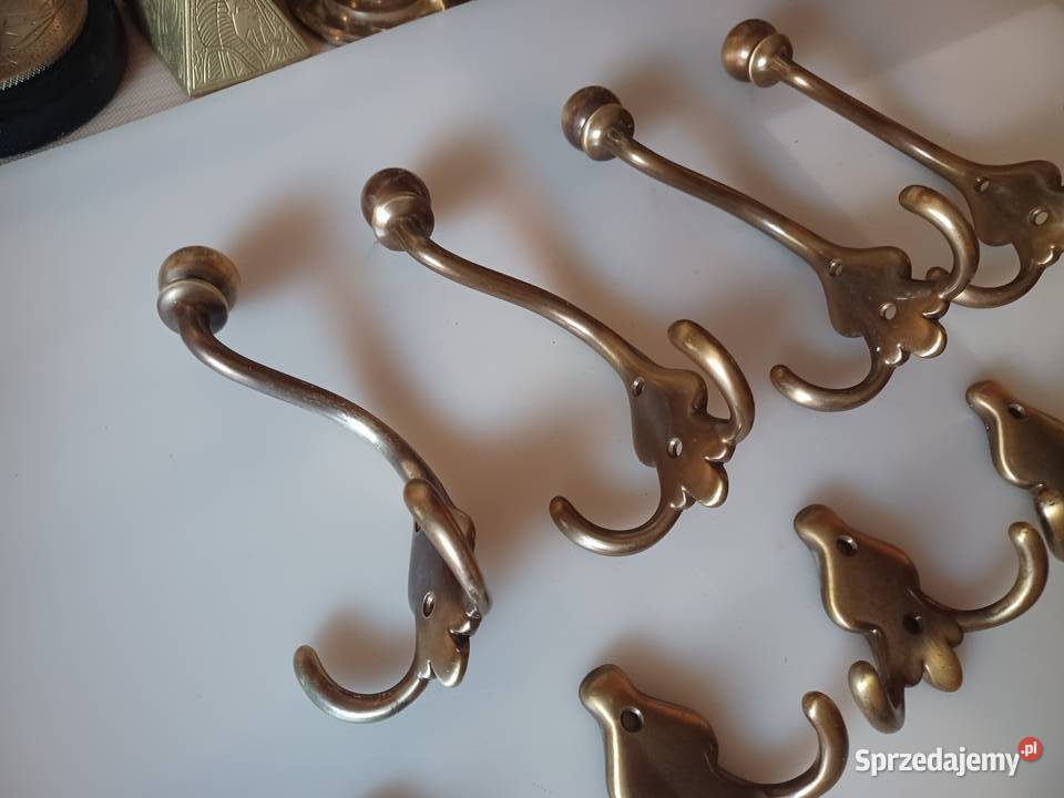 Ładny komplet masywnych wieszaków Mosiądz Poznań sprzedam