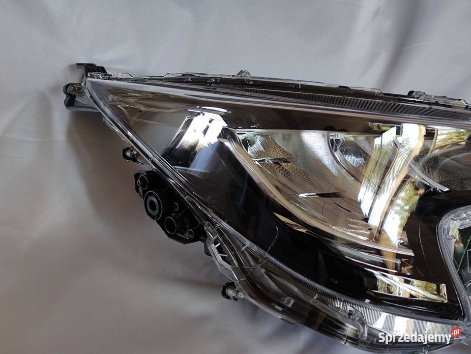 LAMPA LED PRAWY PRZÓD COROLLA E210 8111002S70 Lampy przednie