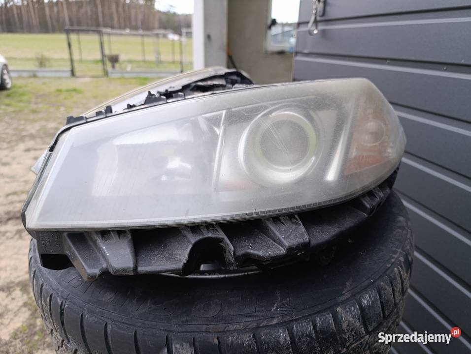 Sprzedam lampy Xenon przód Saab 95 Lampy przednie sprzedam
