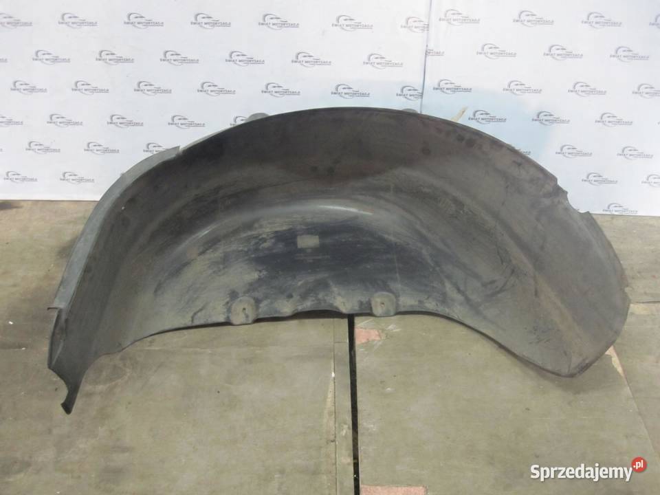 VOLKSWAGEN CADDY III nadkole lewe tył 2K5810971A