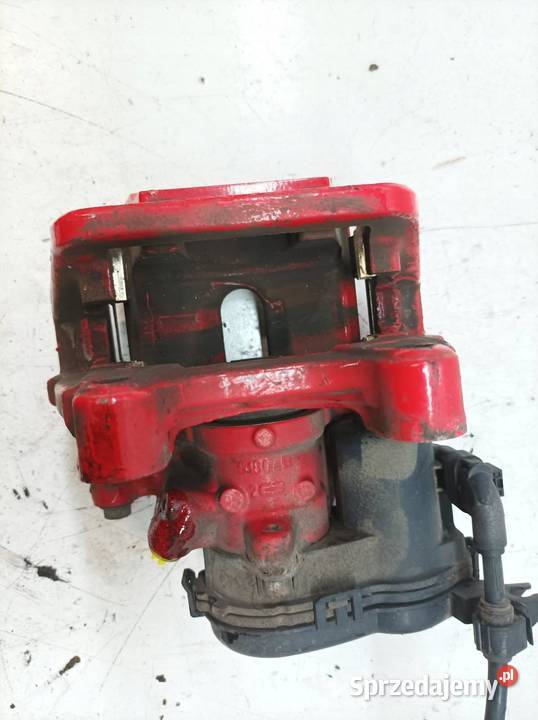 ZACISK HAMULCOWY PRAWY TYŁ ELEKTRYCZNY 20 CGI Zaciski i jarzma