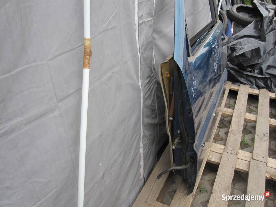NISSAN TERRANO II 03r drzwi lewe przód