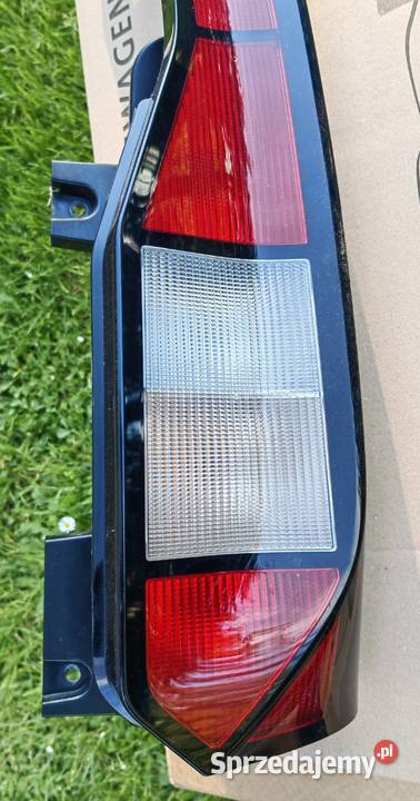 VW CADDY LAMPA PRAWY TYŁ CAŁA 2K7945096A BRAK Rożnów