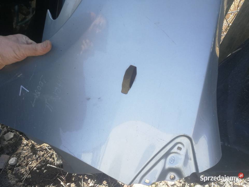 Toyota Yaris 2 2006 błotnik lewy Górno