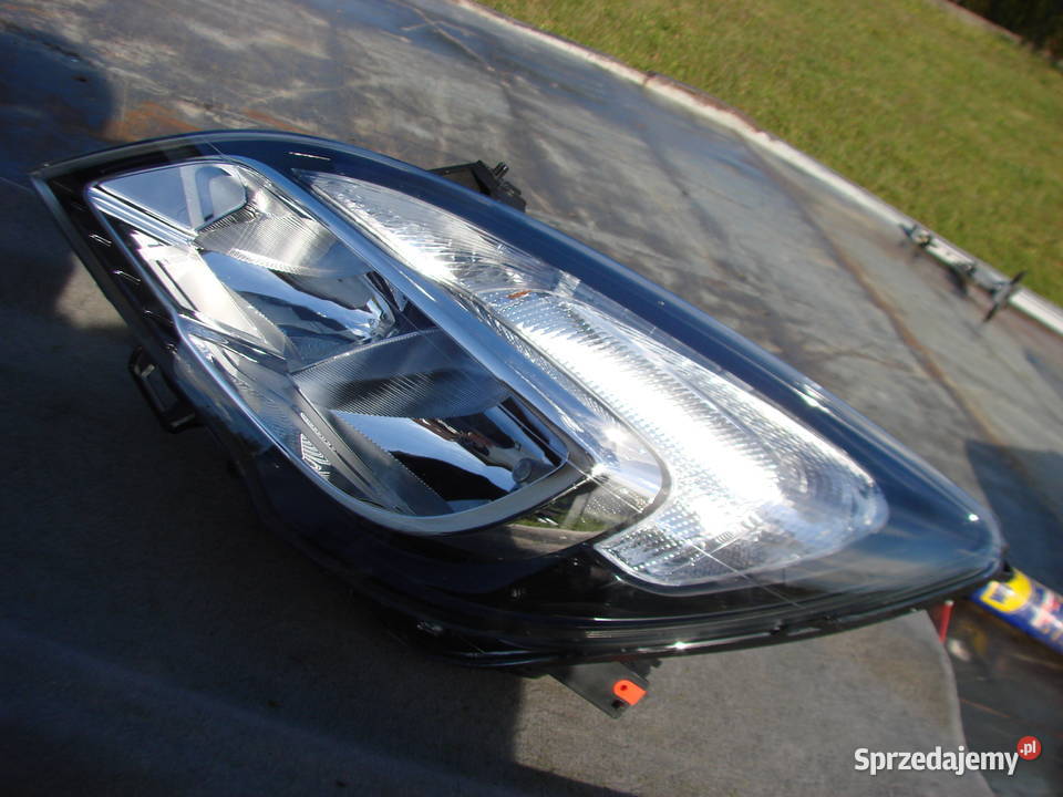 Opel Meriva B reflektor NOWY ORG KPL EU