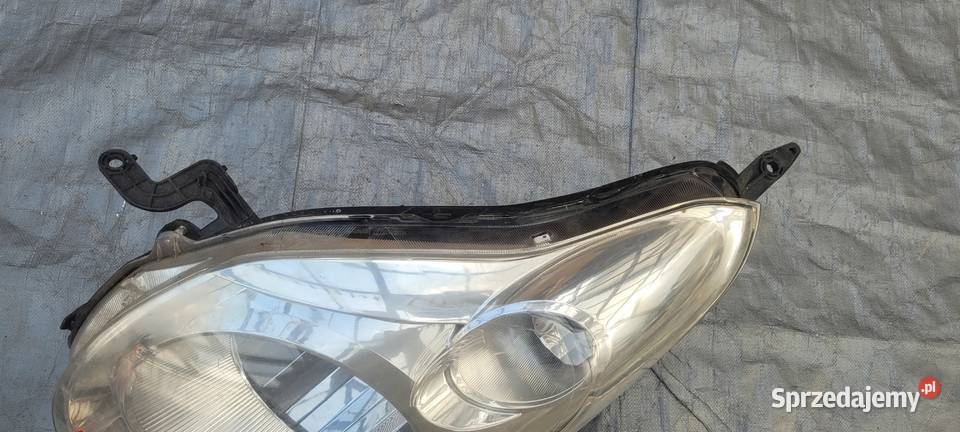SUZUKI ALTO 0914 LEWY REFLEKTOR LAMPA LEWA PRZOD Ruda Śląska