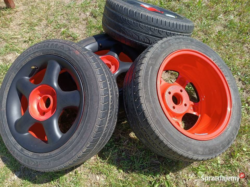 Alufelgi czarnoczerwone z oponami 4 x 108 19555 Samochodowe Białystok sprzedam