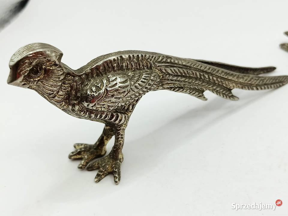 Dwa metalowe ptaki koguty bażanty na spacerze Antyki Zamość