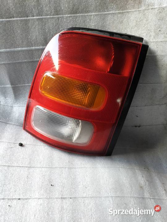 NISSAN MICRA K11 LAMPA PRAWA TYŁ 265506F600 osobowe Kamień-Kolonia