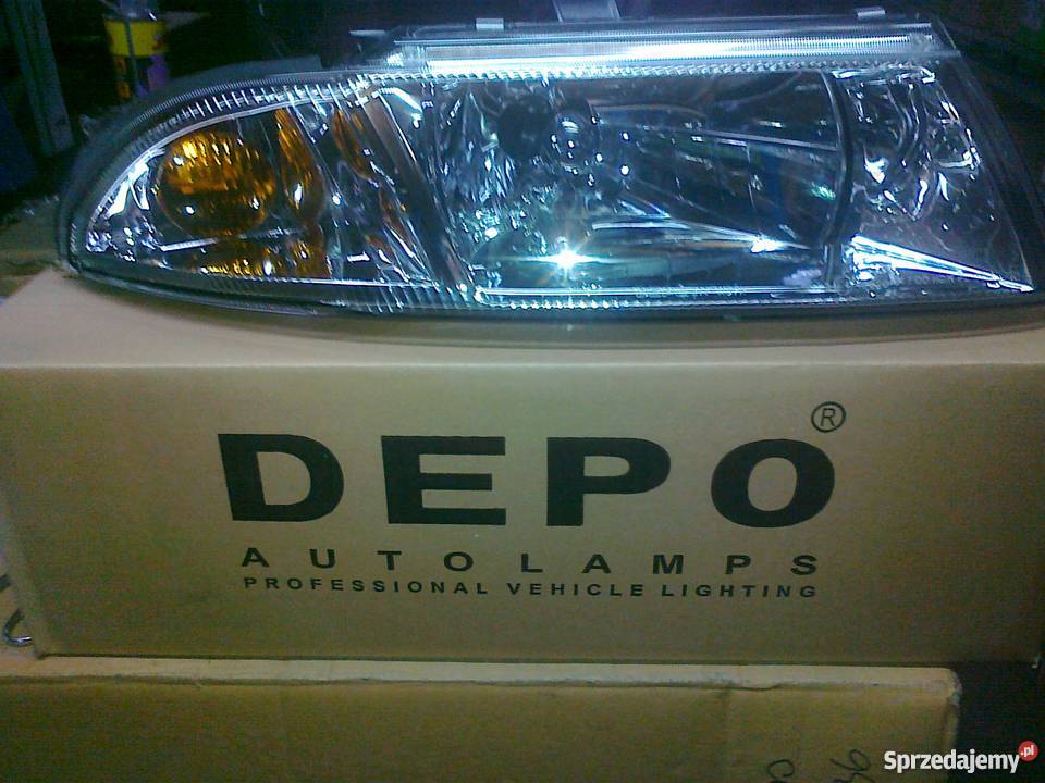 MITS CARISMA 9902 REFLEKTOR ELE NOWY DEPO PR lampy przednie Pruszków