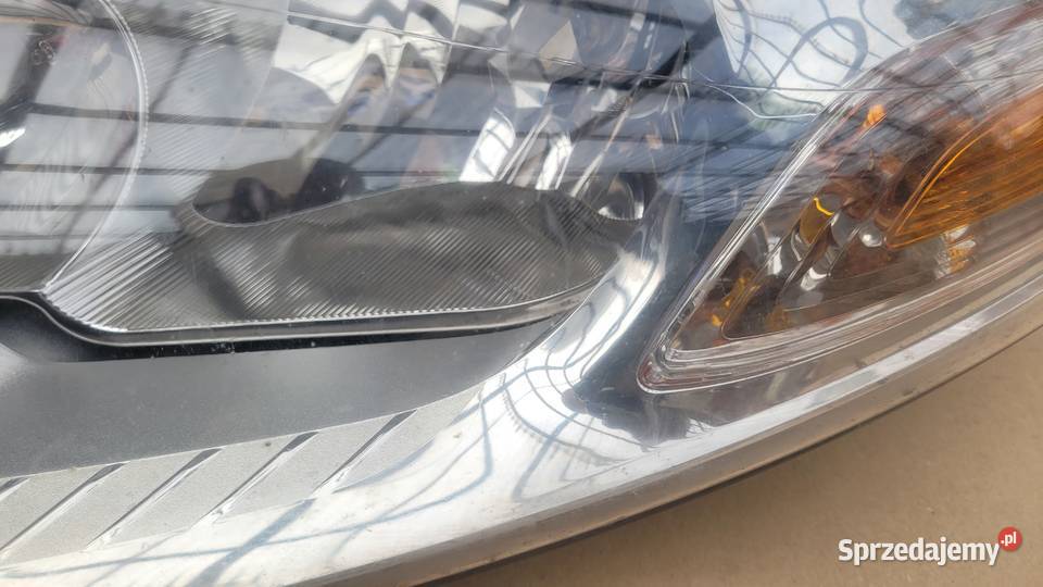 FORD MONDEO MK4 0710 REFLEKTOR LEWY LAMPA PRZÓD