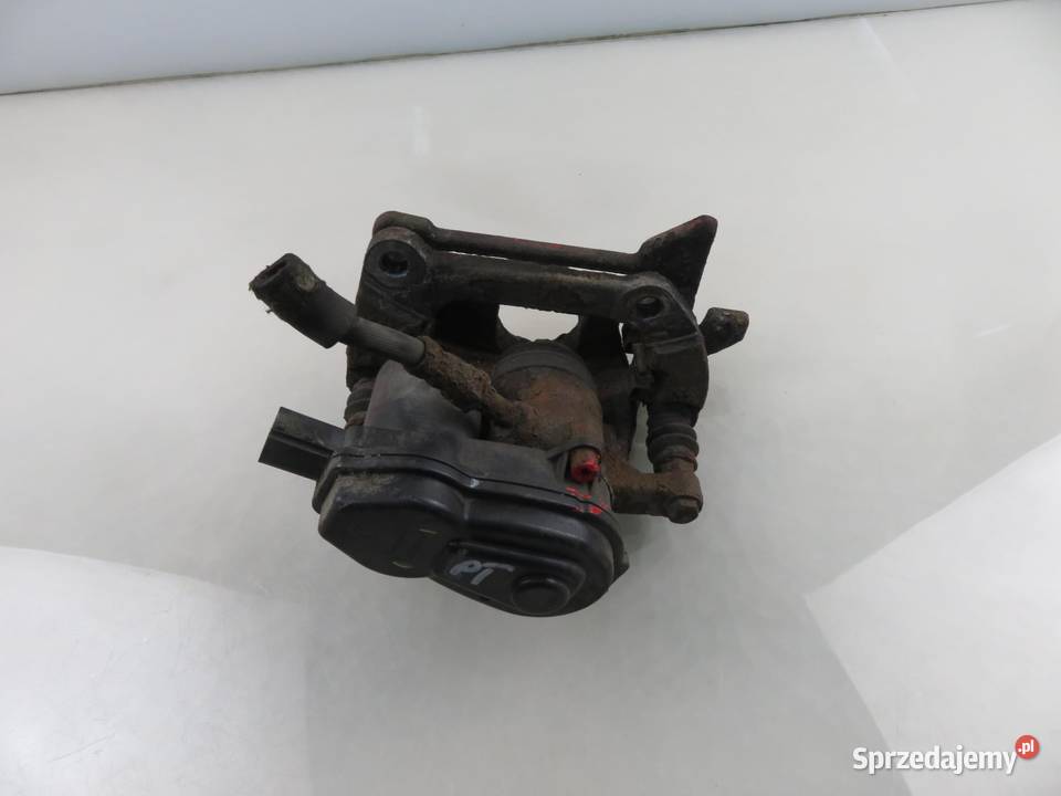 ZACISK PRAWY TYŁ AUDI A4 B8 20 TDI 32335478