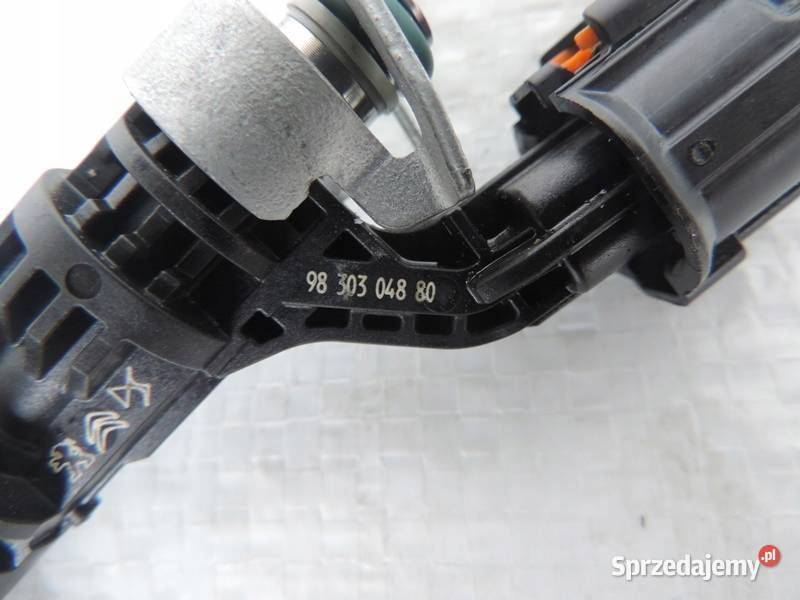 Opel Corsa F 12i Wtryskiwacz 9830304880