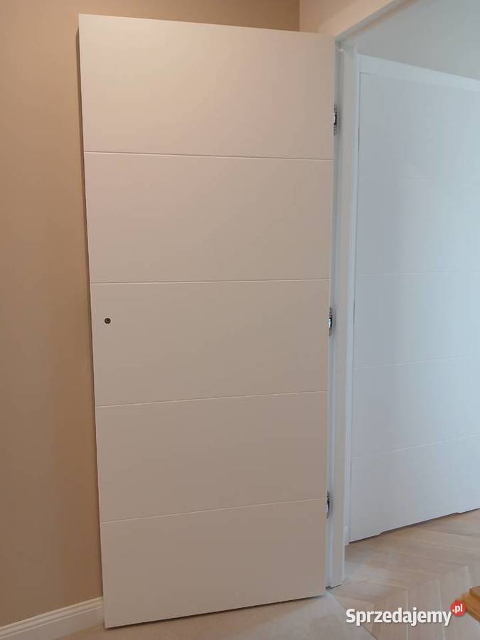 Drzwi drewniane wewnętrzne bezprzylgowe Drzwi wewnętrzne Ostrołęka