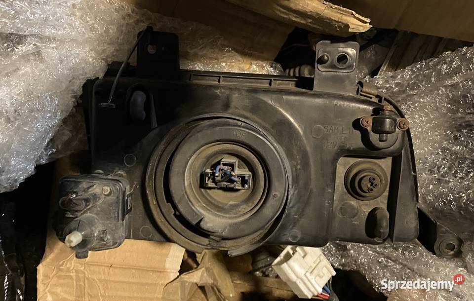 Reflektor lampa Kia Sportage I szklany LE terenowe Oświetlenie