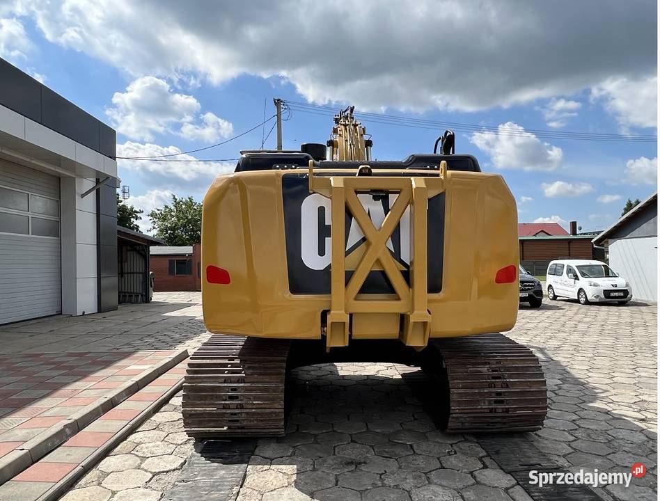 CAT 323 E Tuliszków