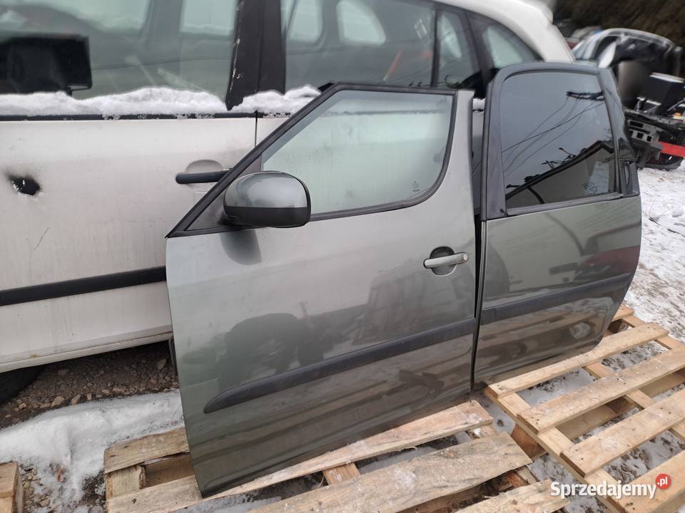 Skoda Roomster błotniki drzwi zderzak lampy pas