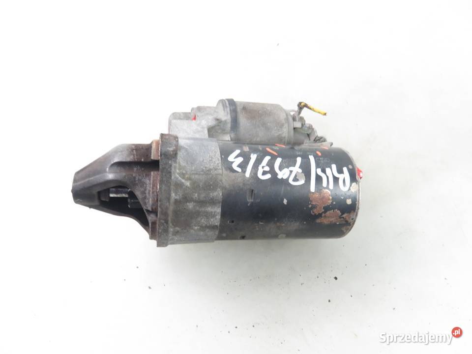 ROZRUSZNIK OPEL CORSA 12 24436877 0001107408 Układ elektryczny silnika małopolskie