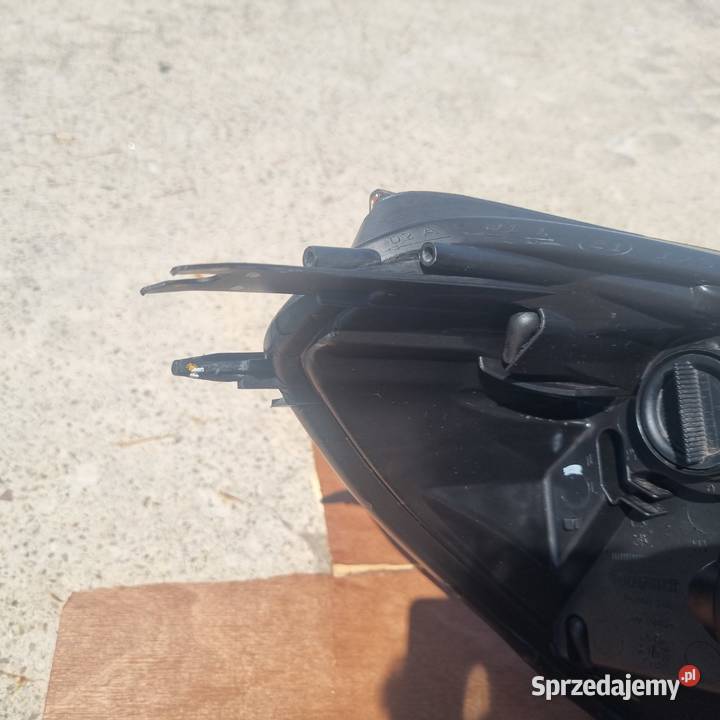 Lampa przednia lewa oryginalna OE Renault Clio Rawa Mazowiecka